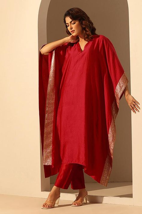 Maroon handloom chiniya silk kaftan with sequins embroidery. Comes with a pant. Components: 2 Pattern: Hand embroidered Type Of Work: Sequins Neckline: V Neck Sleeve Type: Flared Sleeves Fabric: Handloom chiniya silk Color: Maroon Other Details:  Length : Kaftan : 48 inches Sleeve : 11 inches Pant : 37 inches Model Height : 5 ft 6 inches, wearing size S Occasion: Sangeet - Aza Fashions Kurta Set Photoshoot, V Neck Kaftan Pattern, Kaftan Stitching Pattern, Kaftan Kurta Set, Kaftan Photoshoot Ideas, Kaftan Suit Design, Women Kaftan Styles, Unique Kaftan Designs, Kaftan Dress Modern