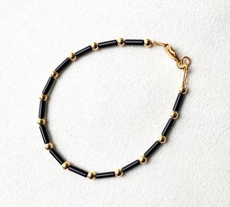 Raven Bracelet, Black And Gold Jewelry, Kids Gold Jewelry, Mom Bracelet, Gold Jewelry Outfits, Anklet Designs, Beads Designs, Black Beaded Bracelets, Trendy Bracelets