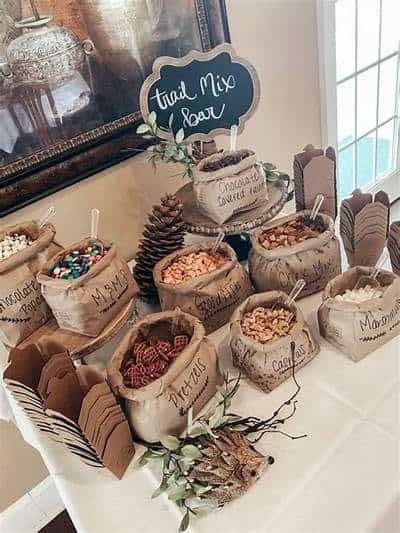 25+ Woodland Baby Shower Ideas You'll Love - One Sweet Nursery Trail Mix Baby Shower Favors, Little Hunter Baby Shower Ideas, Woodland Bridal Shower Ideas, Fall Woodland Baby Shower Ideas, Woodland Party Games, Woodland Winter Baby Shower Ideas, Camping Themed Baby Shower Ideas, Woodland Baby Shower Centerpieces Boy, Outdoorsy Baby Shower Ideas