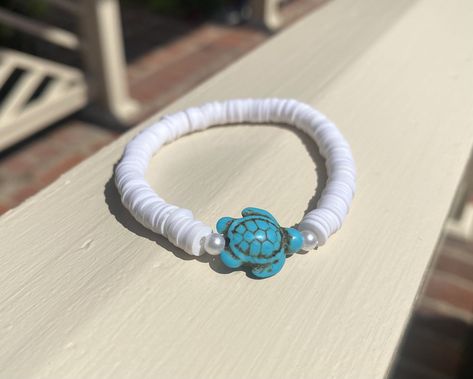 This fashionable Blue Sea Turtle Bracelet is at home when worn at the pool or during a night out. Blue Sea Turtle, Sea Turtle Bracelet, Turtle Bracelet, Summer Bracelets, Richmond Va, White Beads, Sea Turtle, Blue Sea, The Pool