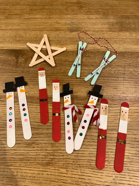 Christmas decorations made from wooden craft sticks and lollipop sticks. #christmas #christmascraftsforkids #craftsticks #christmascraft christmas decorations #popsiclestickcrafts Wooden Sticks Christmas Crafts, Lollipop Stick Christmas Decorations, Lolly Stick Christmas Decorations, Lollipop Stick Craft Christmas, Kids Crafts Christmas Ornaments, Christmas Lolly Stick Craft, Popsicle Christmas Crafts, Lollipop Stick Craft, Stick Christmas Decorations