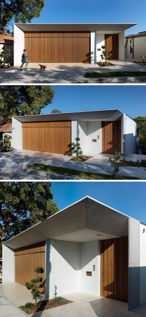 From the street, this modern house has a wood garage that matches the front door. The front door has been slightly set back to provide some protection from the elements. Garage Facade Ideas, Minimal Garage, Garage Facade, Wood Garage, Modern Garage Doors, Wood Garage Doors, Garage Door Design, Modern Garage, Modern House Facades