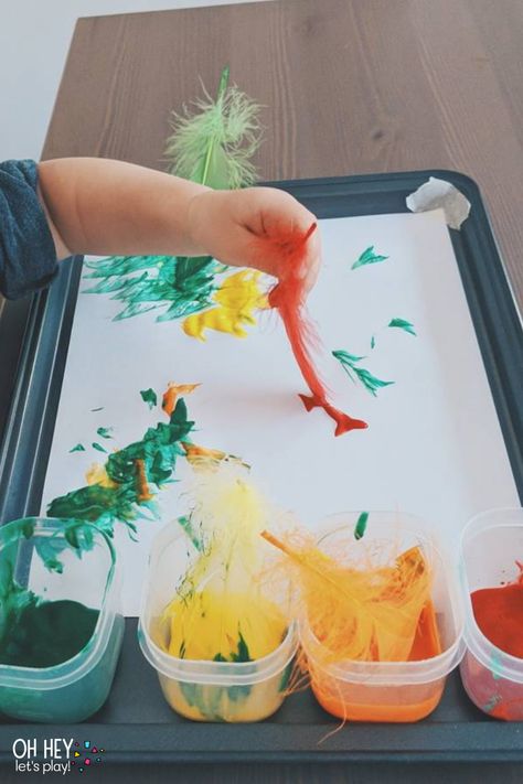 Painting With Feathers Painting With Feathers Preschool, Spring Process Art For Infants, Paint With Feathers, Feather Painting Preschool, Bird Art Toddlers, Bird Theme Activities For Toddlers, Theme Birds Preschool Activities, Bird Activity For Toddlers, Bird Week Preschool Activities