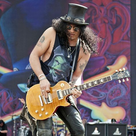 Slash Costume - Guns N' Roses Check more at http://costumerocket.com/slash-costume/ Slash Costume Female, Slash Costume, Celebrity Costumes, Black Halloween Dress, Halloween Dress, Halloween Outfits, Fancy Dress, Roses, Halloween