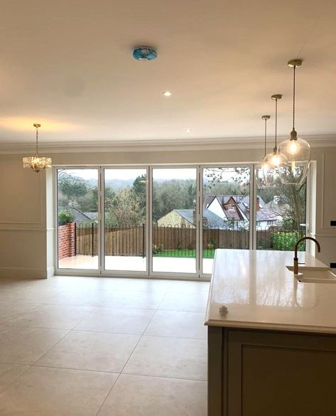 Another recently installed set of 5 panel bifold doors, finished in white! 💫⁠
⁠
The crisp, clean lines of the doors look perfect paired with the red brick, whilst working perfectly with the soft interior scheme. Allowing so much light to flood the extension, they are a wonderful choice all year long. In the Summer, they are the perfect way to extend the living space with the outdoors.☀️⁠ Kitchen With Bifold Doors, Kitchen Bifold Doors, Bifold Doors Kitchen, Bi Folding Doors Kitchen, White Bifold Doors, Bi Folding Doors, Roof Lantern, Extension Ideas, Aluminium Windows