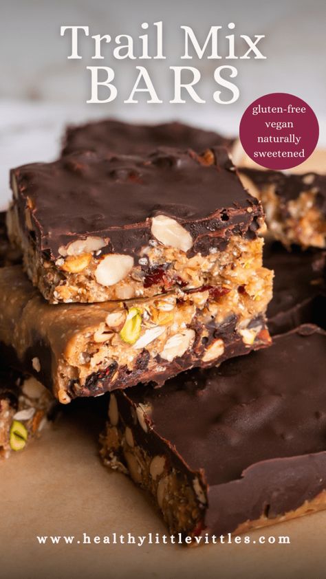 These deliciously crunchy, salty-sweet Trail Mix Bars make the best healthy snack! They are made with a variety of nuts and seeds, dried cranberries, and crispy quinoa mixed with natural peanut butter, coconut oil, maple syrup, and vanilla and then topped with a layer of melted chocolate. These naturally sweetened bars are gluten-free, vegan! Homemade Salty Snacks, Nut Free Trail Mix, Sweet Trail Mix, Trail Mix Bars, Nut Free Snacks, Healthy Trail Mix, Crispy Quinoa, Plant Based Breakfast, Vegan Gluten Free Recipes