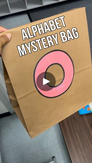 31K views · 6.9K reactions | Letter “O” Mystery Bag! Finally got the chance to use one of my Alphabet Mystery Bags!! It includes items that were already in my classroom and I literally gathered them up the morning of. Other bags may have more but this was just right for our first one. We’ve been learning one letter a day for about a month now (abc bootcamp). Adding this mystery bag made it even more FUN!! I’ll add these letters to my TpT for anyone interested in this idea too! 🐙 

And for those asking - I got the light switch at the dollar store a few years ago!

#iteachk #learnthroughplay #playtolearn #alphabetmysterybag #learningisfun #abcbootcamp
#joyfullearning #happyclassrooms #kindergartenteacher #kindergarten #newteacher #elementaryteacher #teaching #iteach #prek#earlychildhoodeduc Letter O Crafts For Kindergarten, Letter O Activities For Kindergarten, Letter O Activity, Letter O Activities For Preschool, Mystery Bag Ideas, Letter Monster, Abc Bootcamp, Letter O Activities, Angel Ideas