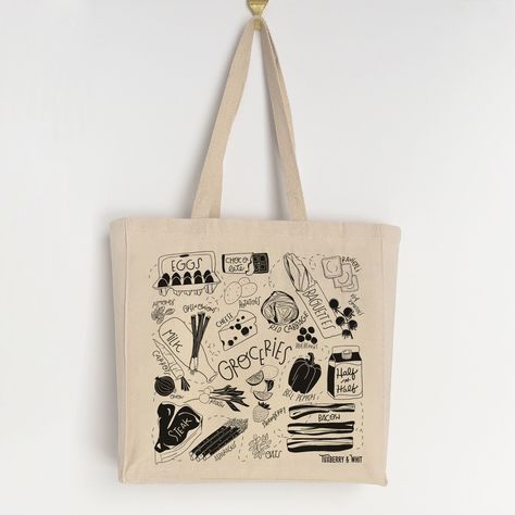 Make grocery shopping a fun and stylish experience with our Groceries tote bag, featuring playful illustrations of all your favorite food items. Made from sturdy 12oz cotton canvas with a gusseted edge, this eco-friendly and reusable bag is perfect for carrying your groceries, and its washable nature ensures it stays fresh and clean for each use. The black and white modern illustration style, combined with hand-lettered labels, showcases the signature style of Tuxberry & Whit. Ideal for both per Grocery Bag Design, Modern Illustration Style, Carry Bag Design, Cafe Merch, Tote Bag Illustration, Coffee Bag Design, Tote Bag Business, Bag Illustration, Grocery Tote Bag