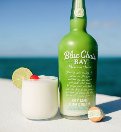 When life hands you limes, you make a Key Lime Colada. Blend all ingredients together. Pour into a cup rimmed with coconut flakes. Garnish with a lime wheel and a cherry.  #bluechairbay #keylime #rumcream #keylimerumcream #keylime #keylimecocktail #limecocktail #colada #keylimecolada #coladarecipe #rum #rumrecipe #coladadrink Kenny Chesney Key Lime Rum Recipes, Blue Chair Bay Rum Recipes Key Lime, Blue Chair Key Lime Rum Recipes, Blue Chair Bay Key Lime Rum Recipes, Lime Treats, Key Lime Colada, Colada Drinks, Key Lime Rum Cream, Banana Rum