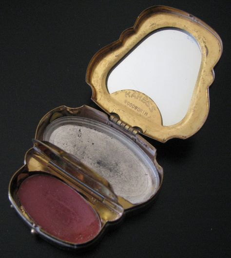 Sale-was $125 now $110! FREE SHIPPING Really cool Vintage Collectable, one make-up compact from 1917 made by Karess Woodworth. Has an interesting shape and opens up to find 2 compartments, one for rouge (still has original rouge inside) and a compartment that held face powder. Top of the lid has a mirror. Has some wear on the outside, see pictures, but overall a very good collectable piece. Due to the shape it is a rare find! Can be polished to reduce tarnish. 1930s Makeup, Vintage Compact, Old Makeup, Kawaii Stuff, Vintage Cosmetics, Cosmetic Containers, Vintage Vanity, Face Powder, Cool Vintage