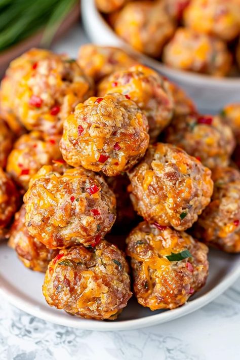 Make pimento cheese sausage balls for a party and watch them disappear! They're loaded with savory meat, creamy cheese, and plenty of spice. Pig Roast Appetizers, Pimiento Cheese Sausage Balls, Appetizers For Soup, Venison Sausage Balls, Appetizer Recipes Game Day, Sausage Snack Recipes, Best Savory Appetizers, Football Brunch Food, Breakfast Sausage Dip