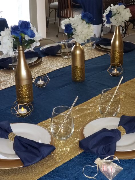 Blue Gold Theme Party, Black Blue And Gold Party Table Settings, Navy Blue And Gold Table Decorations, Navy Blue And Gold Centerpieces For Men, Blue White And Gold Birthday Theme, Navy Blue And Gold 40th Birthday, Navy Blue 18th Birthday Party Ideas, Blue And Gold Anniversary Decor, Wedding Navy Blue And Gold