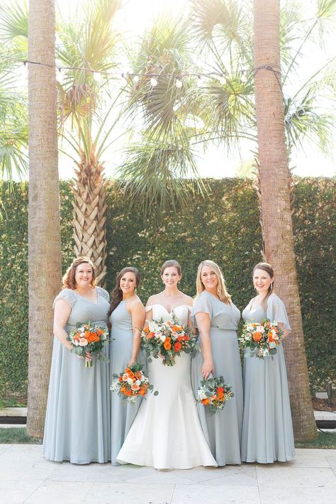 Vibrant orange wedding flowers ✅ a stunning off the shoulder wedding dress ✅ dusty blue bridesmaid dresses ✅ a palm tree lined wedding ceremony ✅ a restaurant wedding reception ✅ Each detail from this colorful, intimate South Carolina wedding was elevated, thoughtful, and true to the couple's love story. Dream turned reality by wedding planner- Pluff Mud Event Planning, florist- OK Florist and wedding photographer- Laura & Rachel Photography. Restaurant Wedding Reception, Dusty Blue Bridesmaid, Dusty Blue Dress, Orange Wedding Flowers, Orange Bridesmaid Dresses, Wedding Gown Inspiration, Dusty Blue Bridesmaid Dresses, South Carolina Wedding, Restaurant Wedding