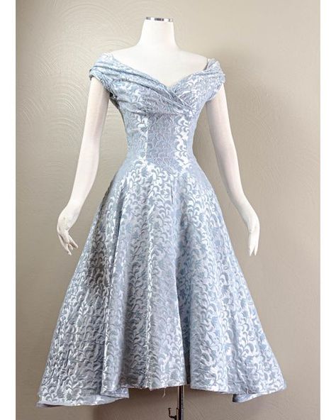 The_Romantiquary on Instagram: "Sold: This gouges 50s icy blue satin jacquard dress is now available. The cut of this dress is perfect. It has a wrap self-bust with a princess seam basque waist and a super full skirt. The jacquard is velveted with the pattern of a plush cotton and it feels so luquaries. The dress fits closest to a size medium with the waist fitting 28”. You can find the full info through the link in my bio. . . . . . . . . . . . ..... . . . . . . #gardenparty #altweddingdress # Alt Wedding Dress, Basque Waist, Jacquard Dress, Icy Blue, Book Ideas, Princess Seam, Blue Satin, A Princess, Modern Fashion