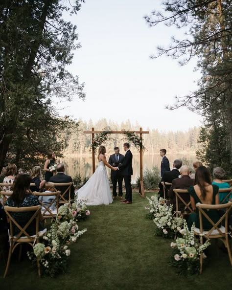 The team at @Fignvine killed it with this dreamy ceremony decor - peep those aisle arrangements! 🌿​​​​​​​​ Photo: @reveriefilms.co​​​​​​​​​​​​​​​​ Rentals: @memorableeventsrentals​​​​​​​​​​​​​​​​ Florals: @fignvine​​​​​​​​​​​​​​​​ Planning: @courtneylawhonevents Small Outdoor Ceremony Set Up, Walkway To Wedding Ceremony, Alters Wedding Outdoor, Wedding Ideas In A Field, Outdoor Covered Wedding Ceremony, Outdoor Elopement Ceremony Decor, Ceremony Outdoor Decor, Spring Outdoor Wedding Ceremony, Wood Wedding Ceremony