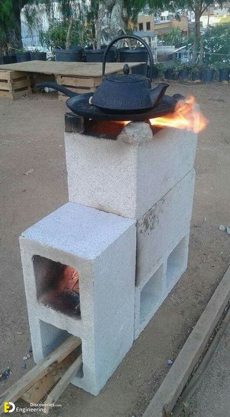 Build Your Own Rocket Stove From Cement Blocks | Engineering Discoveries Outdoor Cooking Stove, Diy Rocket Stove, Cement Home, Diy Rocket, Cement Blocks, Outdoor Stove, Rocket Stove, Outdoor Oven, Cooking Stove