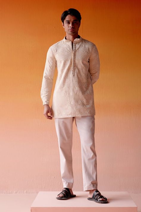 Beige short chikankari kurta with floral jaal pattern embroidery all over and a mirror and bead embroidered placket and sleeve hem. Paired with a pant. - Aza Fashions Short Kurta For Men, Short Kurtas, Chikankari Kurta, Kurta For Men, Kurta Men, Short Kurta, Mens Kurta, Beige Silk, Beige Shorts