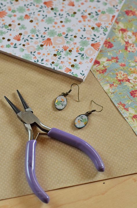 Love finding Mod Podge ideas? Me too! Here’s an easy tutorial for making your own DIY earrings with Mod Podge Dimensional Magic and scrapbook paper. Homemade jewelry with your own special touch! Diy Earrings Paper, Mod Podge Ideas, Diy Earrings Tutorial, Mod Podge Dimensional Magic, Crazy Laura, Mod Podge Crafts, Homemade Earrings, Decoupage Diy, Paper Bead Jewelry