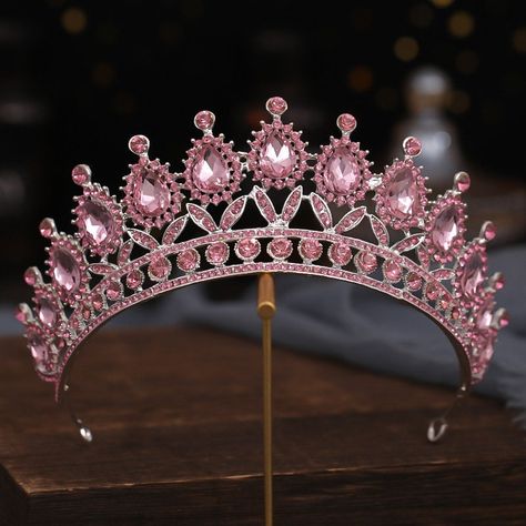 Feel like royalty on your special day with this beautiful Rose Rhinestone Crystal Crown Bride Tiara. Handcrafted from high-quality crystals, rhinestones, and alloy, this tiara is a combination of delicate flowers and shimmering stones that add a touch of elegance to any bridal or formal occasion look. Measuring 14.5 cm in diameter and 6 cm in height, it's lightweight and comfortable to wear throughout the day. The rose color of the tiara is perfect for adding a unique twist to your bridal or pri Crown For Wedding, Crown Bridal Hair, Crown Bride, Pageant Crowns, Bridal Tiaras, Crystal Wedding Jewelry, Hair Accessories Bridal, Crystal Bridal Tiaras, Bride Tiara