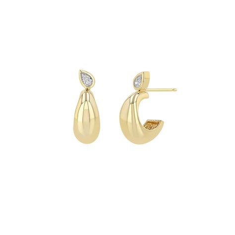 14k gold tapered half round small huggie hoop earrings with an angled bezel set pear shaped diamond set at the top of each hoopSPECIFICS • earring is approx. 13.5mm tall x 12.5mm deep• inner diameter of hoop is approx. 8mm• earring is approx. 7mm at widest point• pear diamond is approx. 4mm x 2.5mm• white diamonds .24 ctw Boucheron Jewelry, Convertible Jewelry, Pear Diamond, Pear Shaped Diamond, Diamond Set, Huggie Hoop Earrings, Bezel Diamond, Girls Jewelry, Fine Jewellery Earrings