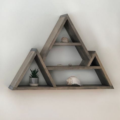 Wood Mountain Shelf Dimensions Width: 5.1/2 inches (shelf depth) Length: 30.3/4 inches Height: 21.1/4 inches tall  The mountains are calling!  This beautiful shelf would make a wonderful addition to your home. It will be a unique focal point to your living room, nursery, or bedroom. These shelves are perfect for that empty spot on your wall and to get creative with!  Great display for crystals, candles, essential oils, small photos, air plants and special little treasures!  Our shelves are custo Wood Mountain Shelf, Wooden Shelf Design, Money Making Projects, Mountain Shelf, Living Room Nursery, Small Woodworking Projects, Crystal Display, Plant Shelf, Bohemian Wall Art