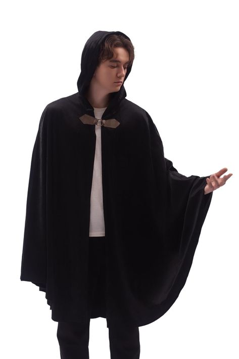 PRICES MAY VARY. Warm and cozy: Crafted from premium velvet, this cloak with hood offers a comfortable, warm, and soft feel. The medieval cloak provides an extra layer of warmth on cool autumn nights. Stylish Medieval Cloak: Adorned with both metal loop clasps and leather buttons, this hooded cape ensures a secure and durable fastening, enhancing its medieval charm. Make your Halloween Journey Transcend Time and Space! Put on this Halloween cloak, and it will make you feel more mysterious. Trans Mens Capes Cloaks, Black Cloak With Hood, Medieval Mens Clothing, Mens Cloak, Halloween Cloak, Cloak With Hood, Mens Cape, Vampire Cape, Velvet Cloak