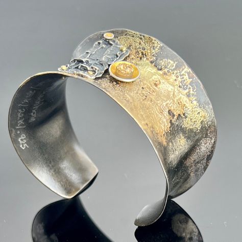 Oh the textures! Just amazing what gold does when fused to steel...so serendipitous and organic are the textures! Add unique touches such as a sterling silver casting, rivets and a sparkle of a glittery small gold stone with the feeling of a druzy, and the outcome is simply stunning! Includes a variety of fused metals including 14K and 22K gold, bronze and shibuichi as well as 24K gold applied in the ancient technique of Keum Boo. As is true of most of my work, I have signed this on the reverse Surface Embellishment, Keum Boo Jewelry, Word Press, Keum Boo, Silver Casting, Statement Cuff Bracelet, Studio Jewelry, Metal Smithing, Metal Cuff Bracelet