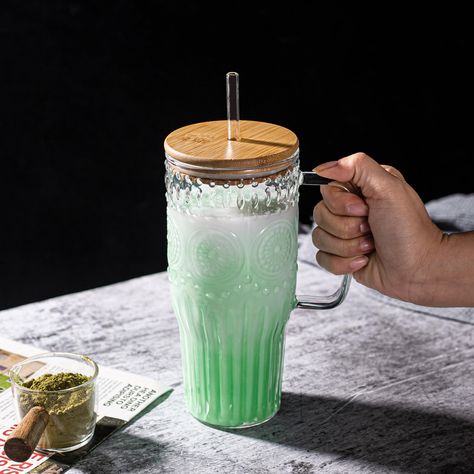 PRICES MAY VARY. Unique vintage sunflower design adds aesthetic appeal to your beverages. Large 32oz capacity accommodates various drinks such as juice and milkshakes. Made from high-quality glass material with excellent transparency for easy cleaning and maintenance. Includes reusable bamboo lids and straws to ensure freshness and portability of your drinks. Features a comfortable handle design for enjoying your beverages anywhere, anytime. Introducing the Bandesun Tumbler Glass Cups with Handl Cute Cups Tumblers, Glass Cups With Vinyl, Milkshake Glasses, Ads Inspiration, Milk Glasses, Funny Tumblers, Christmas Gift Inspiration, Beverage Bar, Vintage Sunflower