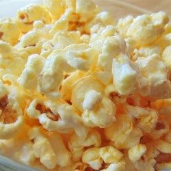 White Chocolate Popcorn - Allrecipes.com Almond Bark Popcorn, Chewy Oatmeal Bars, White Chocolate Popcorn Recipe, Chocolate Covered Potato Chips, White Chocolate Popcorn, Candied Almonds, Popcorn Recipe, Chocolate Popcorn, Almond Bark