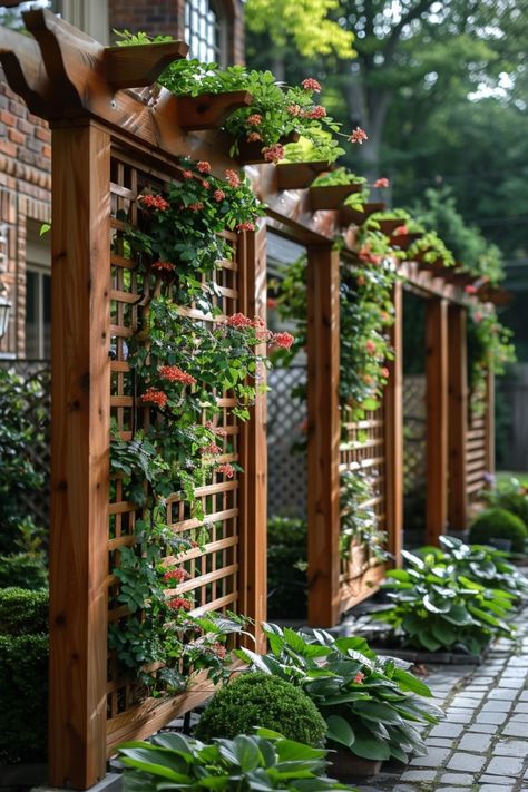 Place lanterns or solar-powered lights along pathways or near seating areas for a warm glow. Lattice Garden Wall, Trellis Ideas For Privacy, Trellis Ideas Garden, Outdoor Trellis Ideas, Wooden Garden Trellis, Arbor Trellis, Big Leaf Plants, Greenhouse Nursery, Garden Trellis Ideas