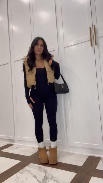 Bodysuit With Uggs, Casual It Girl Outfits, Good Style Outfits For School Winter, Jumpsuit Outfit With Uggs, Winter Fashion Outfits Uggs, Fits With Puffer Vest, Unitard Outfit Ideas Fall, Jumpsuit And Vest Outfit, Jumpsuit And Uggs Outfit