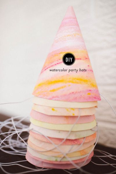 Party hats! http://www.stylemepretty.com/living/2015/06/03/diy-watercolor-party-hats/ | Photography: Michele Hart - http://michelehartphotography.com/ Watercolor Party, Watercolor Birthday, Butterfly Party, Diy Watercolor, Party Entertainment, Art Party, Party Hat, Easy Diy Crafts, Diy Party