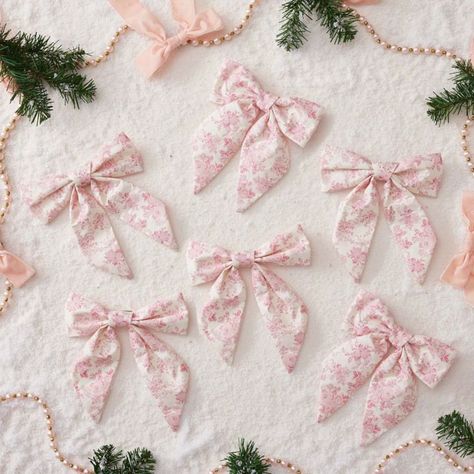 Sweeten your tree-trimming tradition with these charming bow ornaments. Printed with pink blooms, these handmade accent pieces are also perfect for decorating wreaths, garlands or presents. Designed exclusively for Pottery Barn Teen by lifestyle brand LoveShackFancy. Made from cotton, polyester and iron clip. Features a hand printed finish. Each comes with a clip for hanging. Set of 6. Imported. Bow Ornaments, Bow Garland, Boho Christmas Decor, Decorated Wreaths, Christmas Dreaming, Fancy Print, Pink Xmas, Pink Christmas Decorations, Pink Holiday