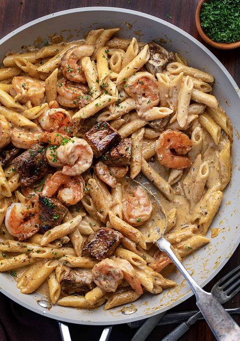 Creamy Cajun Steak And Shrimp Pasta, Blackened Steak And Shrimp Alfredo, Steak Shrimp Pasta, Cajun Steak And Shrimp Pasta, Steak And Shrimp Alfredo Pasta, Cajun Shrimp And Steak Alfredo Pasta, Steak And Pasta Dinner, Steak And Shrimp Alfredo, Surf And Turf Pasta