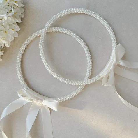 Greek Orthodox Stefana with ivory pearls 🤍 Handmade with love and blessings for your special day 💍 We are happy to help you with any questions you may have. Send us a private message us or contact us on 00357 99 936 996 #grecianevents #wedding #greekorthodoxwedding #greekorthodoxstefana #stefana #orthodoxstefana #greekorthodoxweddingcrowns #stefanacrowns #bridalheadpiece #στεφανα #στέφανα #στέφαναγάμου Greek Orthodox, Ivory Pearl, Wedding Crown, Handmade With Love, Bridal Headpieces, Your Special, Special Day, With Love