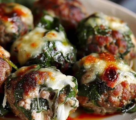 Bobby Flay | Spinach Garlic Meatballs Stuffed With Mozzarella | Facebook Meatballs Stuffed With Mozzarella, Savoury Party Food, Garlic Meatballs, Mediterranean Recipes Healthy, Mozzarella Stuffed Meatballs, Mozzarella Recipes, Parmesan Crusted Chicken, Bobby Flay, Parmesan Crusted