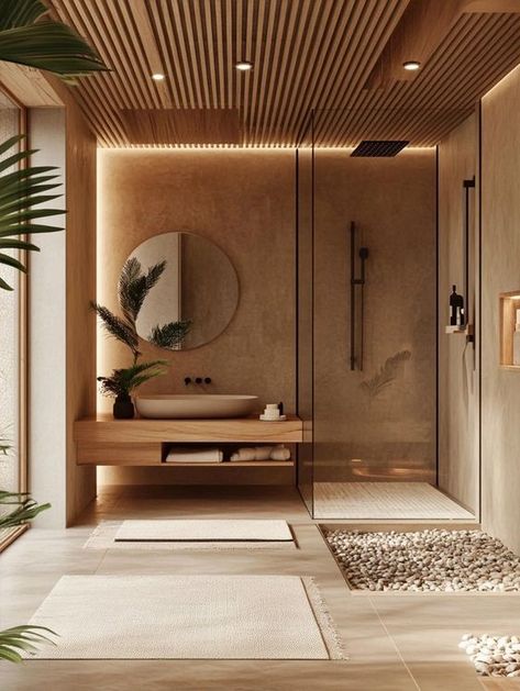 Elevate your bathroom with Japandi-inspired tubs and showers that embrace natural materials and serene designs. Discover how to create a calming oasis with elements like wooden bathtubs and stone showers that blend seamlessly with the Japandi aesthetic. #JapandiBathroom #NaturalDesign #SereneSpaces Stylish Shower Over Bath, Modern Japandi Bathroom Design, Bathroom Japandi Design, Japandi Spa Interior, Japandi Aesthetic Interior, Japanese Minimalist Bathroom, Minimalist Apartment Bathroom Decor, Japandi Spa Design, Modern Japandi Bathroom