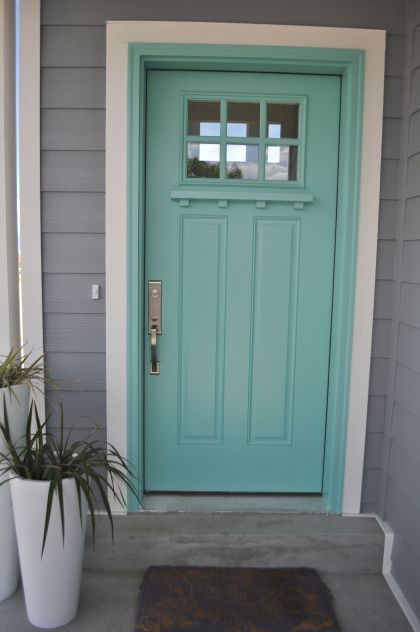 I want a turquoise front door SO BAD. And this is the perfect pin since I figured a gray house with white trim would work well for any color door. Porches Ideas, Turquoise Door, Blue Front Door, Glass Railings, Turquoise Front Door, Front Door Paint Colors, Gray House, Door Colors, Hijau Mint