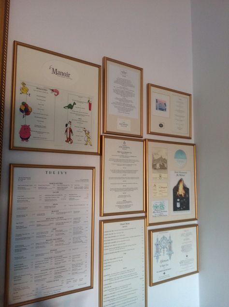 Wall of framed menus as a memento of favourite restaurants and special experiences Gallery Wall Restaurant, Picture Menu Design, Restaurant Wall Frame Ideas, Kitchen Menu Wall Decor, Menu Gallery Wall, Gallery Wall In Restaurant, Framed Menus Kitchen, Menu Wall, Framed Recipes