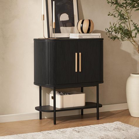 PRICES MAY VARY. Dimensions: 31.3 (W) x 16.9 (D) x 36 (H) ; 30-day return and 1-year warranty Elegant Slatted Tambour Design: Boasting a signature oval silhouette, innovative slatted tambour sliding door design and contrasting handles, our cabinet offers a sleek and space-saving solution, ensuring effortless access to your essentials while maintaining a clean, clutter-free appearance Unmatched Quality: Crafted with a mixed material design with sleek metal legs and a hidden metal structure, this Black Buffet Sideboard, Mid Century Bar Cabinet, Cabinet Console Table, Shelves Pantry, Modern Bar Cabinet, Tambour Doors, Accent Sofa, Entryway Cabinet, Sliding Door Design