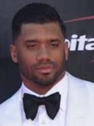 Russell Carrington Wilson (born November 29, 1988) is an American football quarterback for the Seattle Seahawks of the National Football League (NF... Wilson Football, Ciara And Russell Wilson, Ciara And Russell, Pete Carroll, Reggie Bush, Broncos Fans, Real Numbers, Russell Wilson, University Of Wisconsin