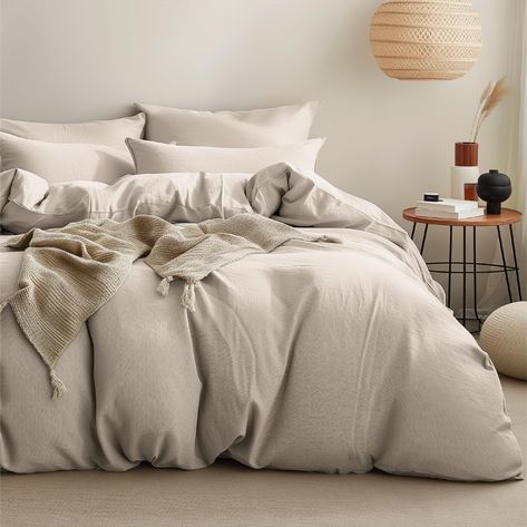 PRICES MAY VARY. Soft, Light, & Skin-friendly: Made from skin-friendly and long-lasting 100% cotton, this elastic jersey duvet cover set features a gentle, delicate, and extra soft hand feel that gets even softer after washes. Enjoy being cuddled up in this soft and lightweight bedding all year round. Ultra-Breathable: The premium cotton fabric offers exceptional breathability and moisture absorption, providing you with a cozy and dry night's sleep all year round. Elevated Home Decor: The solid hue of this jersey knit duvet cover set adds an extra element of personalization, making it easy to coordinate with your room's decor. Convenient Details: With 8 corner ties on the edges and corners, this 100% cotton duvet cover set snugly fits more than 95% comforter duvet inserts. The durable zipp Oatmeal Duvet Cover, Mauve Duvet Cover, Modern Boho Bedding, Comfy Cozy Bed, Light Grey Comforter Bedroom, Cozy Neutral Bedding, Modern Organic Bedding, Amazon Boho Bedroom, Neutral Bedding With Pop Of Color