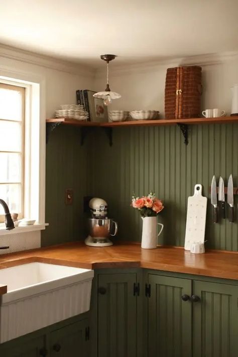 a cozy farmhouse kitchen design with a trendy backsplash Witchy Kitchen Aesthetic, Beadboard Kitchen Backsplash, Green Beadboard, Kitchen Beadboard, Butcherblock Countertops, Cozy Farmhouse Kitchen, Trendy Backsplash, Beadboard Kitchen, Greige Kitchen