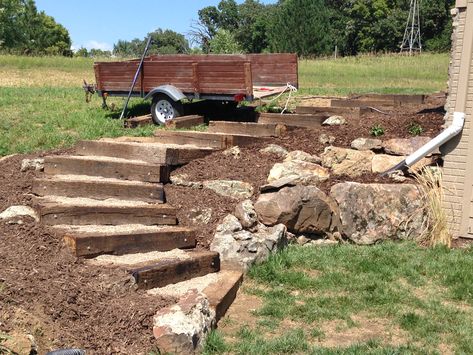 Railroad tie timber steps filled with pea gravel. (Outdoor, exterior, landscaping, stairs) Timber Steps, Terraced Patio Ideas, Railroad Ties Landscaping, Railroad Tie, Landscape Stairs, Landscape Steps, Gravel Patio, Sloped Backyard, Garden Stairs