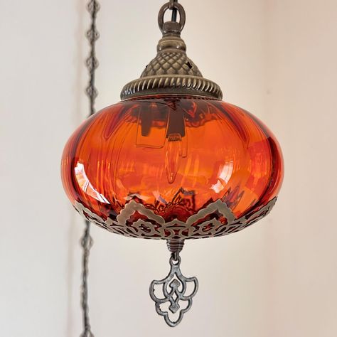 Orange Glass Authentic Lamps #orange #orangeleaves #orangecounty #orangecat #orangeglass #orangelips #orangelight #orangelights #glasslife #glasslighting #glassblowing #glasslamp #hanging #wallhanging #ceilingdesign #ceilinglight #ceilinglights #ceilinglamp #pendantlights #pendantlight #pendantlamps #pendantlighting #swag #swaglamp #swaglight #nightlife #night #nightlights #bedroomlighting #diningroomdecor Hanging Pendant Lights Bedroom, Ceiling Swag, Eclectic Lamps, Plug In Pendant Light, Pendant Lighting Bedroom, Swag Lamp, Turkish Lamps, Lamp Pendant, Moroccan Lamp