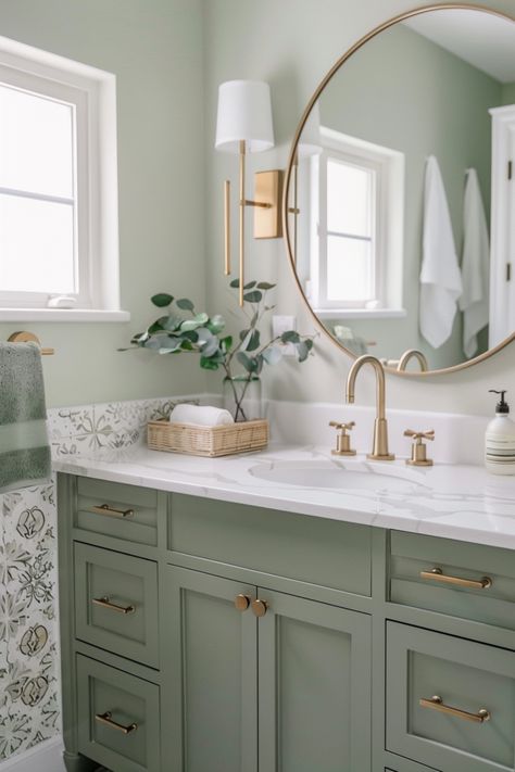 Pair sage green with white accents and natural wood to create a tranquil, spa-inspired bathroom. Click to see more ideas. Bathroom Decor Green Vanity, Studio Green Bathroom, Sw Coastal Plain Cabinets, Sw Sea Salt Bathroom Vanity, Sage Green Color Palette Bathroom, Calming Green Bathroom, Eucalyptus Green Bathroom, Green Vanity With Wallpaper, Green Vanity Bathroom Ideas Paint