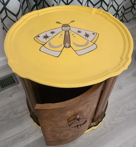 This advantage piece of furniture just needed some love and paint. Check out this hand painted star and moon moth!! #art #artist #painting #paint #desk #furnitureflip #furniture #diy #diyfurniture #sidetable #homedecor #decor #eclectic #eclecticdecor #flowers #nature #moon #halfmoon #moth #deathmoth #mushroom #time-lapse Whimsigoth Painted Furniture, Moon Moth Art, Yellow Moth, Paint Desk, Star Furniture, Moon Moth, Decor Eclectic, Moth Art, Vintage Side Table