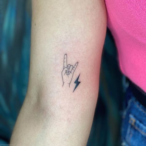 Rock And Roll Tattoos For Women, Concert Ticket Tattoo, Rock N Roll Hand Tattoo, Music Fine Line Tattoo, Minimalist Piano Tattoo, Classic Rock Tattoos, Rock Band Tattoos, Rock Tattoo Ideas, Rock On Tattoo