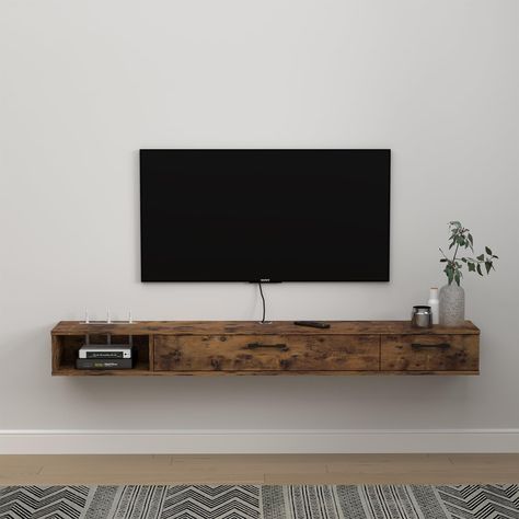 PRICES MAY VARY. [Space-saving & Large Capacity]: Our wall mounted media console is perfect for homes with limited space. With its wall-mounted design, it frees up valuable floor space, allowing you to use the area for other purposes.With 2 doors design provides ample storage space for all your TV accessories. It's perfect for keeping your living room neat and organized. [Easy to Assemble & Clean]: Our floating media cabinet comes with all the necessary hardware and instructions for easy assembl Under Wall Mounted Tv Ideas, Tv With Shelf Underneath, Mounted Tv Storage, Table Under Mounted Tv, Wall Mount Tv Console, Under Tv Cabinet, Floating Shelves Under Tv, Wall Mounted Tv Ideas, Mounted Tv Shelf