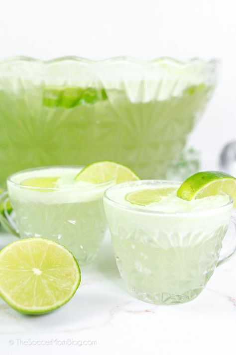 This fizzy lime sherbet punch has a vibrant green color that makes it perfect for St. Patrick's Day, Christmas, or any occasion worth celebrating! St Patrick's Day Drinks, Lime Sherbet Punch, Key Lime Pie Martini, St Patricks Food, Green Cocktails, Easy Party Punch, Homemade Gummy Bears, Mojito Drink, Sherbet Punch